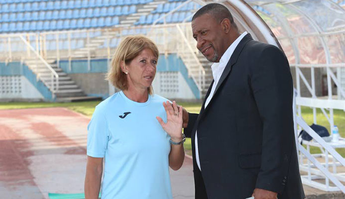 T&T Womenâ€™s football team head coach Carolina Morace chats with TTFA president David John-Williams during here first training session at the Ato Boldon Stadium in Couva, last week. Photo by:TONY HOWELL