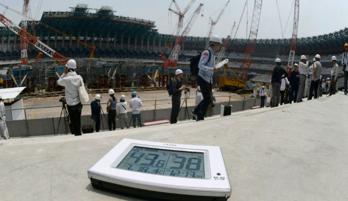 This photo taken on July 18, 2018 shows an electronic thermometer showing the temperature exceeding 40 degrees Centigrade (104 F) during a media tour at the construction site for the new National Stadium, venue for the upcoming Tokyo 2020 Olympic Games, in Tokyo. Photo: AFP 