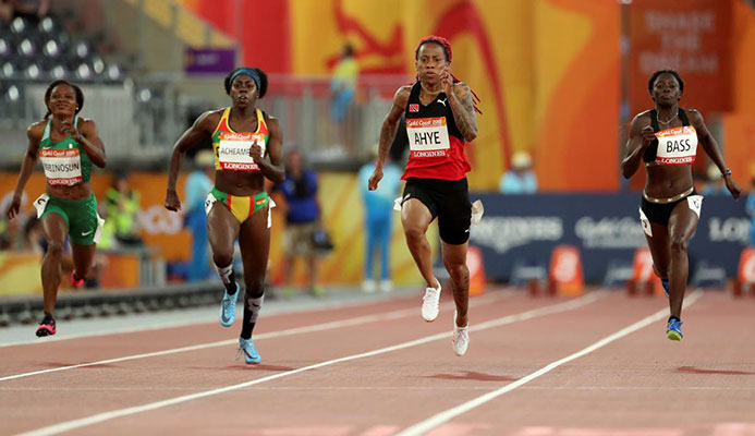 Trinidad and Tobago’s Michelle-Lee Ahye, second right, leads the field to win her women’s 100m semifinal at the Carrara Stadium during the 2018 Commonwealth Games on the Gold Coast, Australia, yesterday.