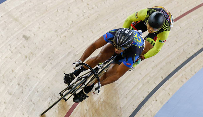 TT and Rigtech Sonics rider Njisane Phillip, left, defeats Edgar Verdugo of Mexico in three rides to progress to the semi-finals of the PSL Fire on Wheels held at the National Cycling Centre, Couva, Saturday.