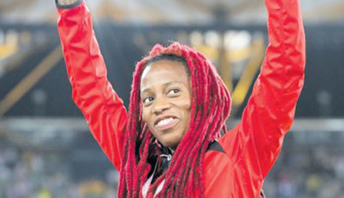 T&T Michelle-Lee Ahye acknowledges the crowd during her medal ceremony at the Gold Coast 2018 XXI Commonwealth Games at Carrara Stadium, Gold Coast, Australia, last week. PICTURE CA-IMAGES/ALLAN CRANE