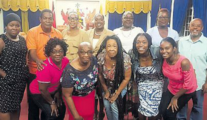 Former national netballer Peggy Castanada, third from left front row poses with other coaches and indiviudals, who will play a major part in the Regional Corporation’s ‘Back 2 Basics’ Community Netball Programme, at a Meet and Greet reception on July 4 at the Arima Town Hall. With her are Nikeisha Felix-Lewis, from left, back row, Councillor Michael Castellano (Arima Borough Corporation), Alderman Onika Haynes (Vice-Chair Tunapuna Piarco Regional Corporation), Jaime Browne (Programme Director), Jacqueline Morris, Margaret Francis, Councillor Anthony Davis (Arima Borough Corporation) and in the front row from left: Odette John, Veronica Mc Donald-Nicoll, Kielle Connelly and Daniella Hall.