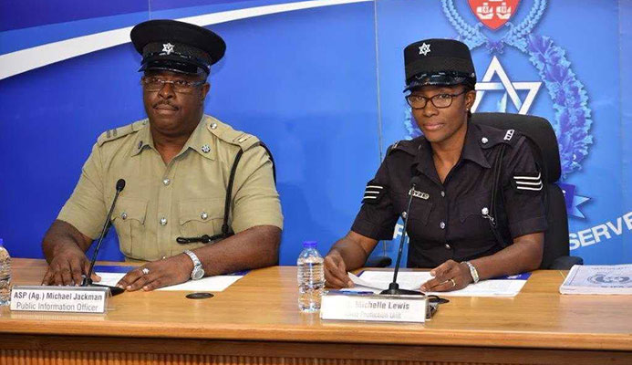 PROTECT OUR YOUTHS: Sgt Michelle Lewis of the Child Protection Unit and Acting ASP Michael Jackman at police press briefing at Police Administration Building in Port of Spain. PHOTO COURTESY TT POLICE SERVICE