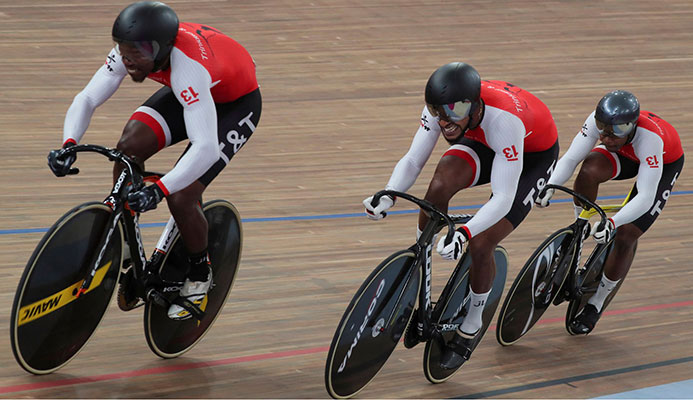 FLASHBACK: Trinidad and Tobago cyclists, left to right, Nicholas Paul, Njisane Phillip and Keron Bramble during their Men’s Team Sprint gold medal effort at the 2019 Pan American Games in Lima, Peru, last August 1. Team TTO were stripped of that medal and also a silver in the Men’s Individual Sprint, due to a positive drugs test, which is under appeal by one of the athletes. —Photo: AFP