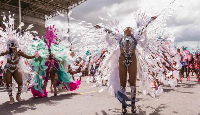 Tribe band revelers during Trinidad Carnival TRIBE