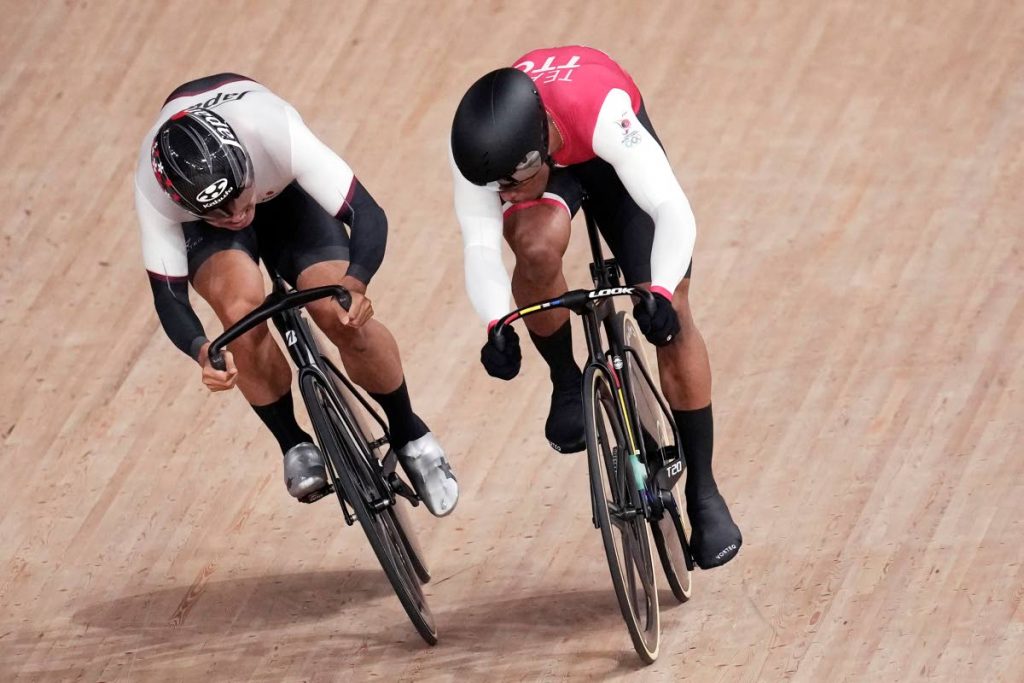 In this August 5, 2021 file photo, Nicholas Paul of Team Trinidad And Tobago, right, and Yuta Wakimoto of Team Japan compete during the track cycling men's omnium scratch race at the 2020 Summer Olympics, in Izu, Japan. (AP Photo) -