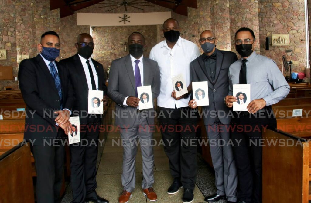 From left, TT Football Association media officer Shaun Fuentes, former Strike Squad captain Clayton Morris, Soca Warriors head coach Angus Eve, former TT goalkeeper Clayton Ince, football administrator Richard Piper and former presenter Roger Sant are seen at the funeral for the late sports broadcaster Anthony Harford, at the Church of the Assumption, Maraval, on Monday. - SUREASH CHOLAI