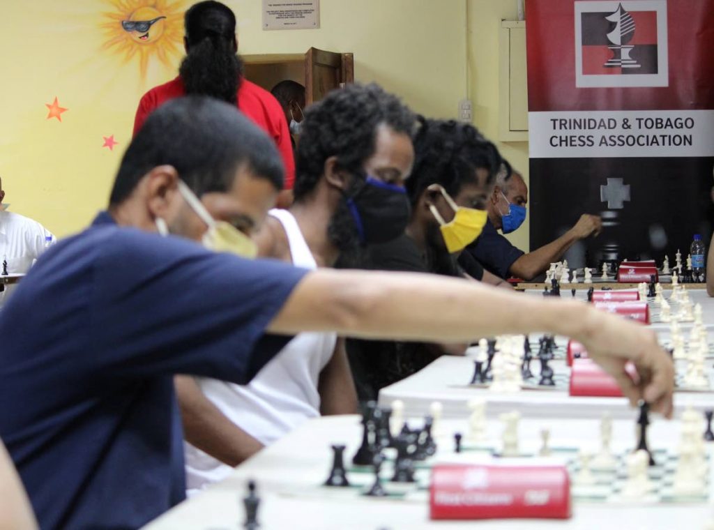In this Sep 21 file photo, inmates at the Port of Spain prison compete for a spot on the national team which featured, for the first time, at the Inter-Continental Chess Championships on the weekend. - via TT Chess Association