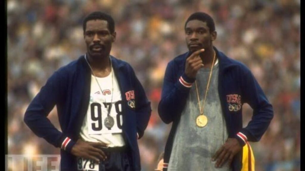 Wayne Collett (left) and Vince Matthews at the 400m Olympic ceremony at the 1972 Games in Munich, Germany. - (Image obtained via www.newsday.co.tt)