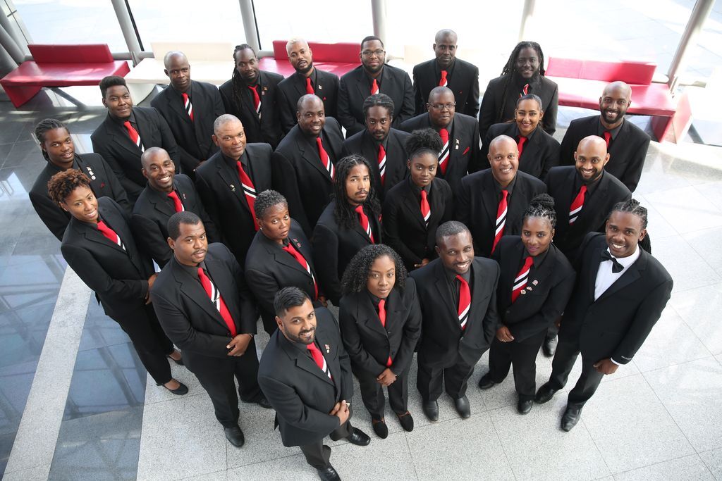 Members of the T&T National Steel Symphony Orchestra (NSSO) pose with their musical director, Akua Leith, front right. (Source: guardian.co.tt)