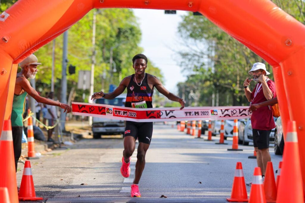 Omare Thompson finishes first in the TTIM 5K overall male event at the Queen’s Park Savannah, Port of Spain on March 23. - Photo by Daniel Prentice (Image obtained at newsday.co.tt)