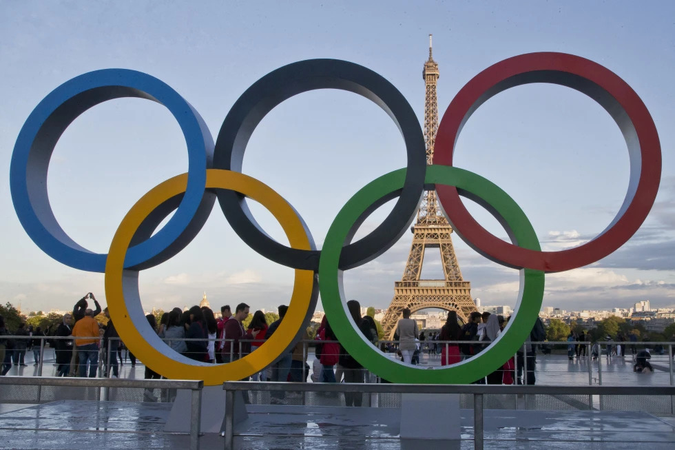 FILE - The Olympic rings are set up at Trocadero plaza that overlooks the Eiffel Tower, a day after the official announcement that the 2024 Summer Olympic Games will be in the French capital, in Paris on Sept. 14, 2017. The United States is predicted to top the medals tables — both the overall count and gold-medal count — for the 2024 Paris Olympics, according to one forecast released on Friday, Jan. 26, 2024, six months before the Games open on July 26. (AP Photo/Michel Euler, File) (Image obtained at apnews.com)