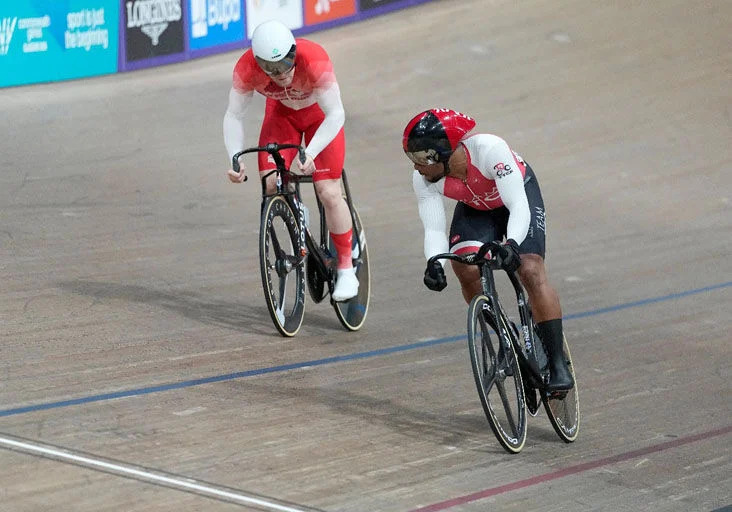 ‘CAT AND MOUSE’: Team TTO’s Nicholas Paul, right, and England’s Harry Ledingham-Horn compete in the men’s sprint semi-finals in track cycling at the Sir Chris Hoy Velodrome, during the Commonwealth Games in Glasgow, Scotland, on Saturday. Paul beat the Brit 2-1 to advance to the final before going under in straight rides to Australian Leigh Hoffman in the race for gold. —Photo: AP (Image obtained at trinidadexress.com)