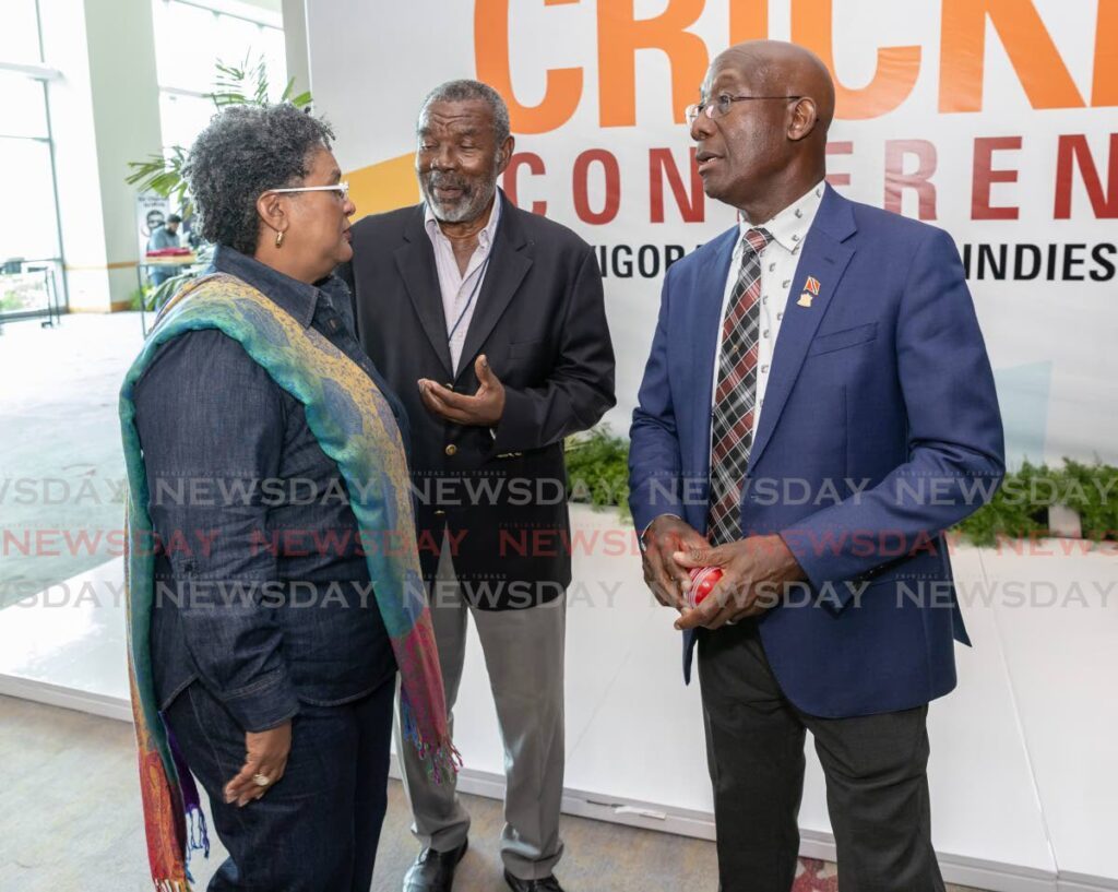 The Prime Minister (R) speaks with Barbados prime minister Mia Mottley (L) and former West Indies cricketer Sir Charles Griffith at the Caricom Regional Cricket Conference at the Hyatt Regency, Port of Spain on April 25. - Photo by Jeff K. Mayers (Image obtained at newsday.co.tt)
