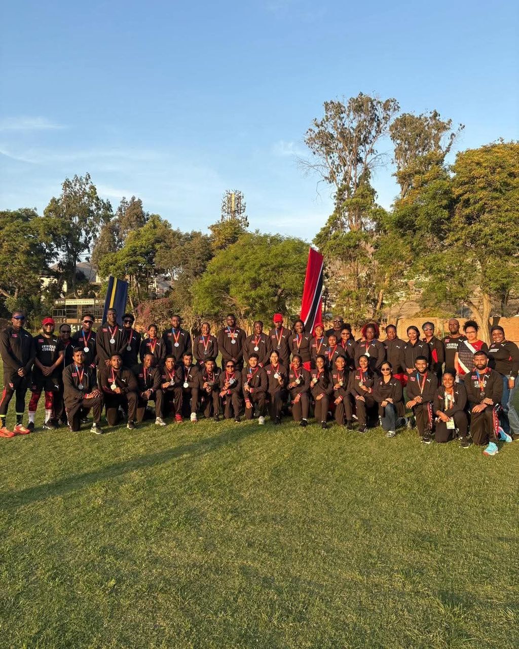 T&T men's and women's players pose with their silver medals after placing second in their respective cricket competitions at the Bolivarian Games in Peru on the weekend.  Courtesy Team TTO (Image obtained at guardian.co.tt)